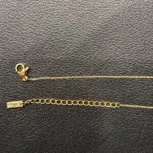 ATOLEA INITIAL NECKLACE "M" STAINLESS STEEL PLATED WITH 18K GOLD. 17.5 - 19.5 IN