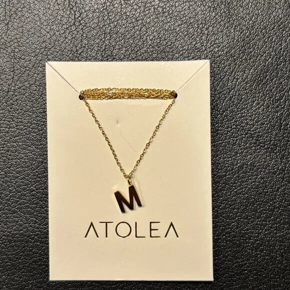 ATOLEA INITIAL NECKLACE "M" STAINLESS STEEL PLATED WITH 18K GOLD. 17.5 - 19.5 IN
