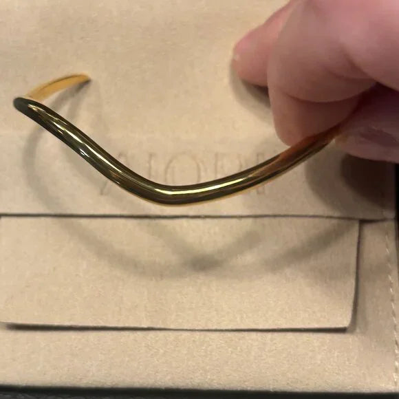 3 PIECES OF AIORI JEWELRY: 2 CLIP ON EARRINGS - 1 BANGLE